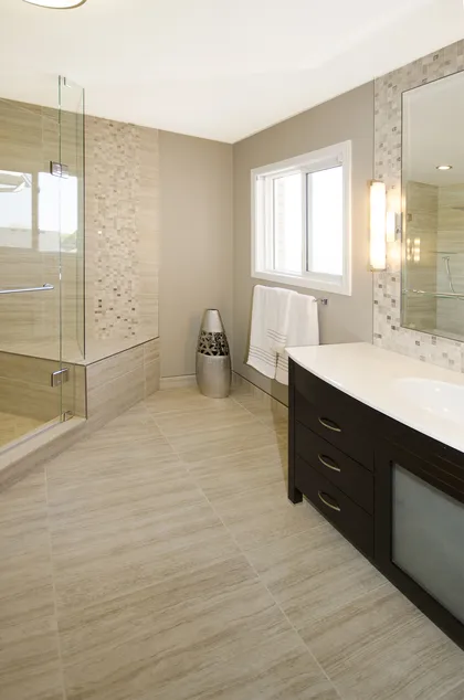 Ensuite with a Large Corner Shower - Image 6