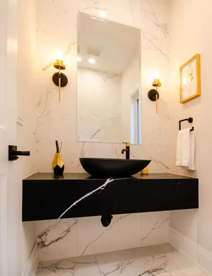 Chic Modern Bathroom Renovation with Gold Accents - Image 2