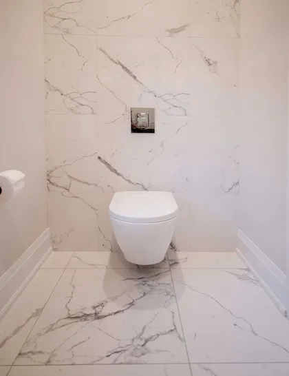 Chic Modern Bathroom Renovation with Gold Accents - Image 8